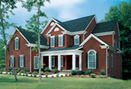 Picture of exterior residential house with vinyl siding.