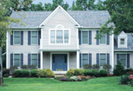 Picture of exterior residential house with steel siding.