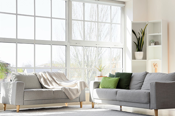 Large living room window that spans floor to ceiling.